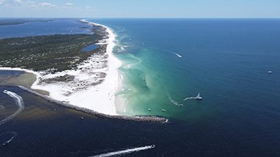Things To Do https://emeraldbeachproperties.icnd-cdn.com/images/thingstodo/Visit Shell Island Aerial photo.jpg